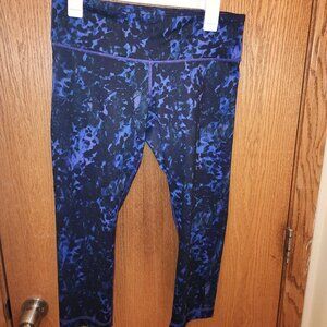 Lululemon purple leggings crop right above ankles